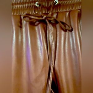 Faix leather pant. color is burgundy. Worn one time, perfect condition.